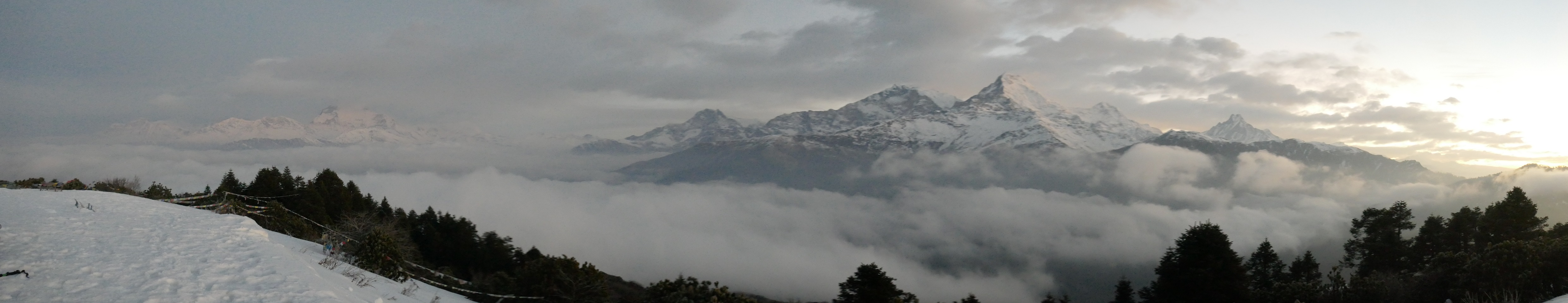 View of rugged mountains, terraced fields, and traditional villages on the Manaslu Trek Upper Route.