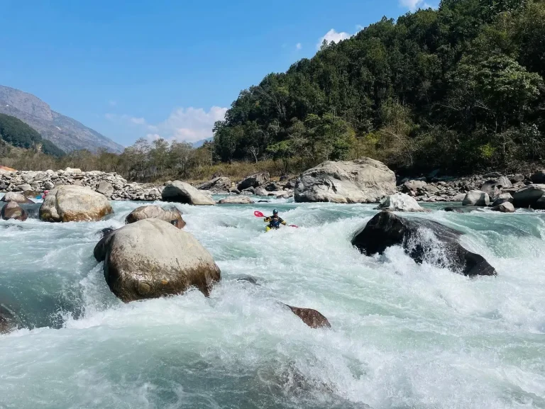 Kayaking adventure in the Budhi Gandaki River valley along the Manaslu trekking route in Nepal
